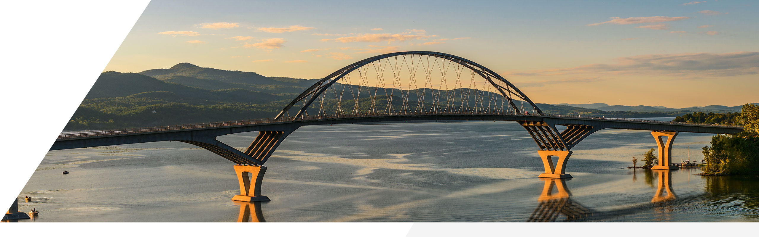 A cross-border bridge connecting Quebec, Canada with the Champlain Valley, USA.