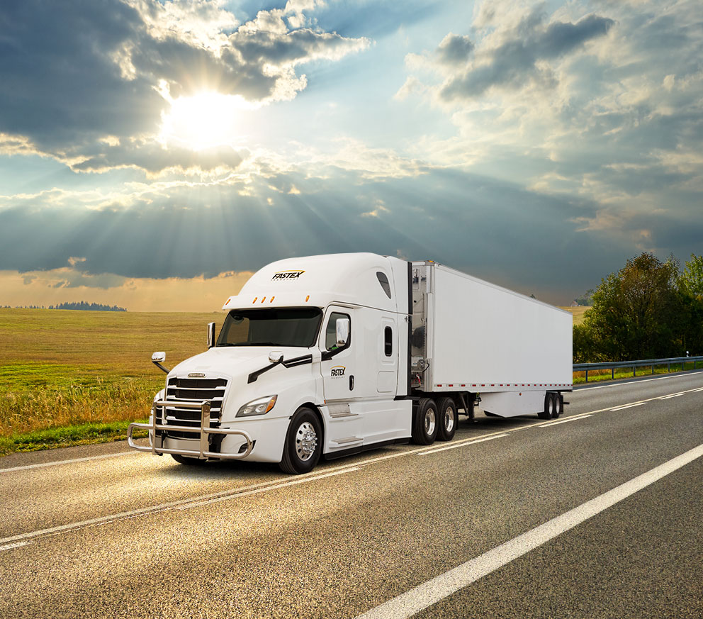 Fastex transport truck driving on the road between Quebec, Canada and the Champlain Valley, USA.