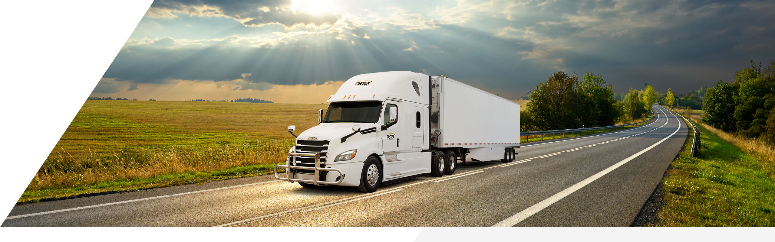 Fastex transport truck driving on the road between Quebec, Canada and the Champlain Valley, USA.